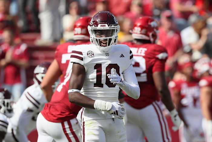 Oct 21, 2023; Fayetteville, Arkansas, USA; Mississippi State Bulldogs safety Corey Ellington (10) celebrates after a stop against the Arkansas Razorbacks at Donald W. Reynolds Razorback Stadium. Mississippi State won 7-3. Mandatory Credit: Nelson Chenault-USA TODAY Sports